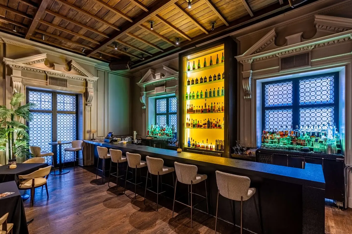 The illuminated bar inside the Champagne Room